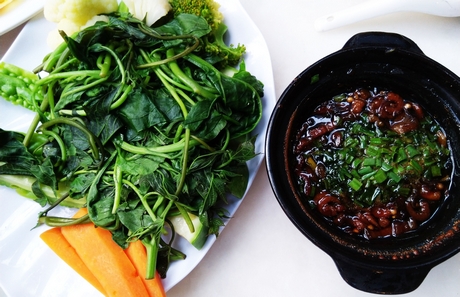 Boiled wild greens with caramelised pork dip